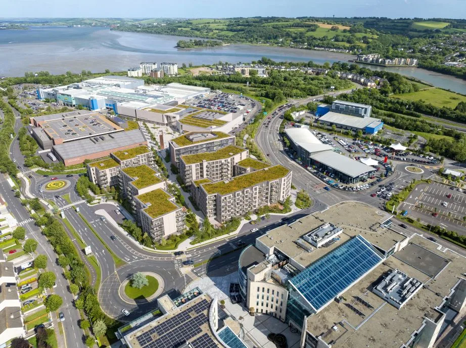 Aerial visualisation of Mahon Point, Cork, showing the existing shopping centre, retail park, and the wider scheme in context.